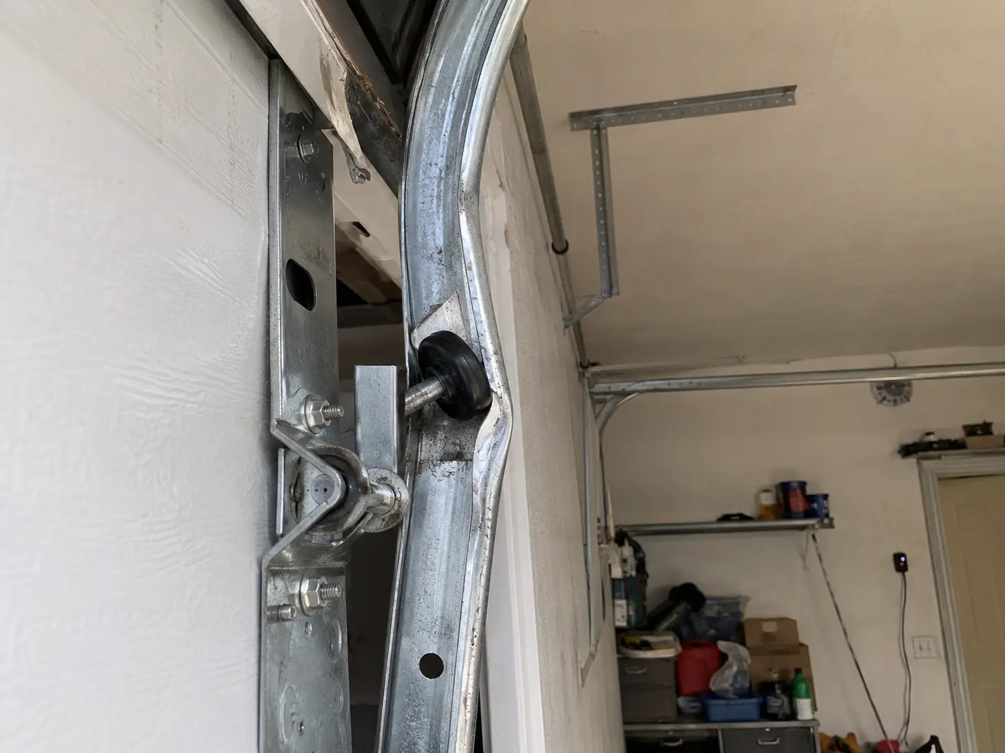 damage garage door track repair
